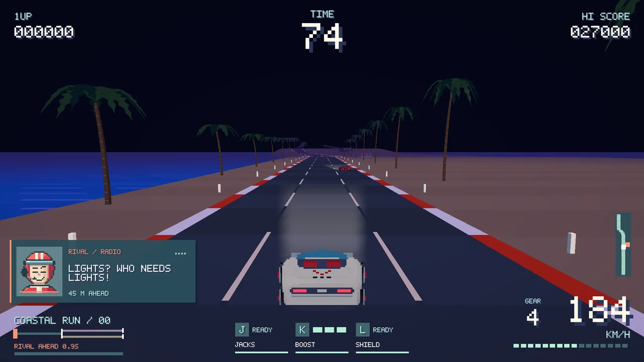 Headlights light the road at night.